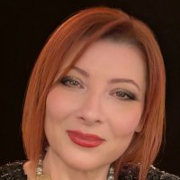 Corina Obertas